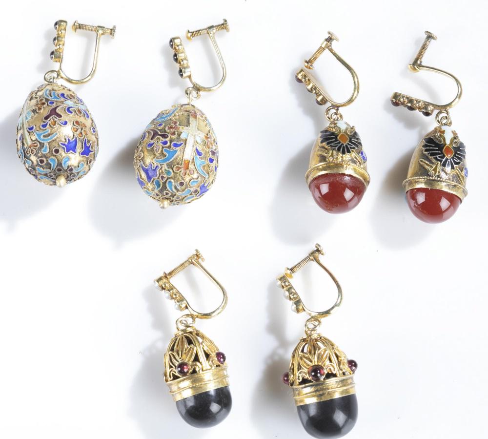 3 Pairs of pendant drop earrings.: A group of three pairs of pendant drop earrings. Marked "China 925." ++ Cloisonne egg shaped earrings. Cross decoration. 1 3/4" x 3/4". Approx. 12.8 g. ++ Gold tone pendant earrings. 1 1/2" X 1/2". Ap