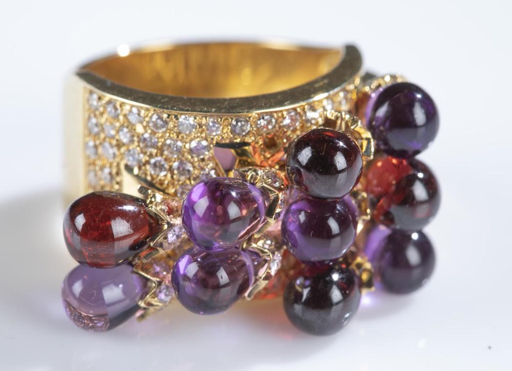 Denoir, amethyst 18k gold ring.: A Denoir amethyst 18k gold ring. Marked on band. Size 7 1/2. Approx. 18 g.