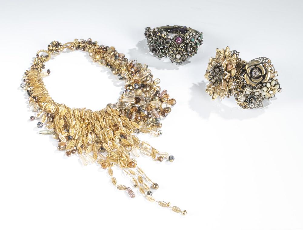 3 Miriam Haskell, bracelets & necklace.: A group of three pieces of Miriam Haskell jewelry. Stamped on tag and backs. ++ Two hinged bracelets with sculptural flowers and beads and crystals. 3" and 3 1/4". ++ Gold tone divided beaded necklace