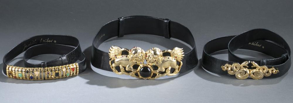 3 Judith Leiber, belts.: A group of three Judith Leiber black belts. Gold tone hardware. Marked on interior. Includes dust covers and one box. ++ Double snake belt. Wear to gold tone hardware. Tape residue on interior. Overal