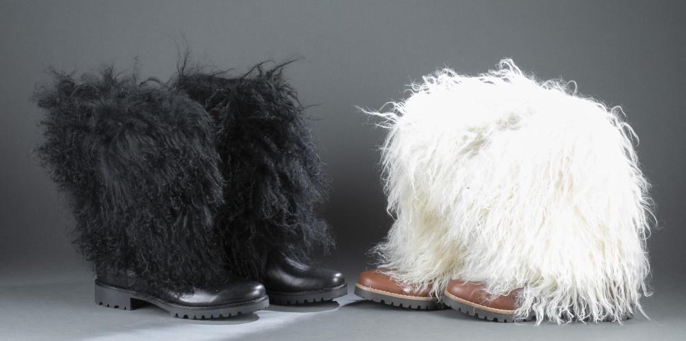 2 Pairs of Michael Kors boots.: Two pairs of Kors by Michael Kors round toe leather mid-calf boots with fur shaft. One pair black leather with black fur, the other brown leather with white fur. Size 10.