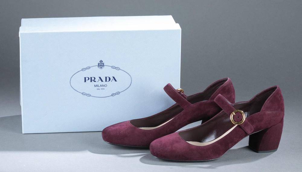 Prada, suede heels.: Prada round toe maroon suede heels with buckle strap and low block heel. Leather sole. Size 10. Comes with box.