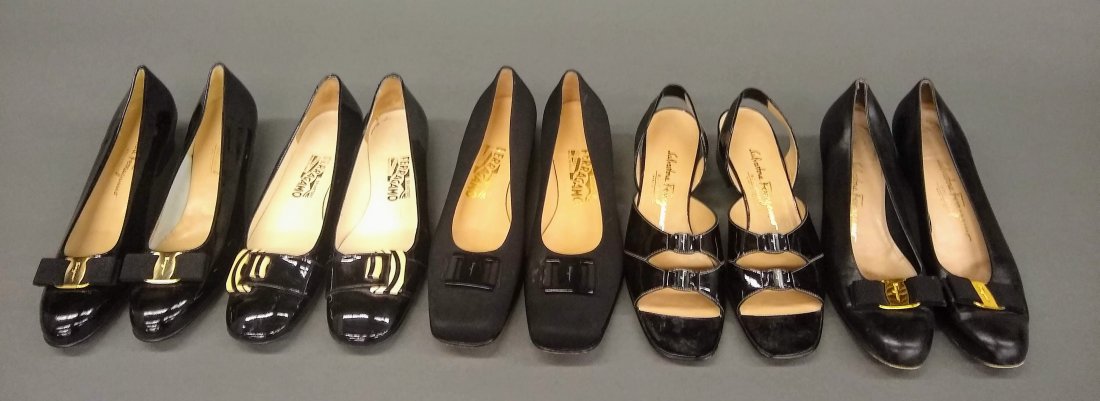 5 Pairs of black leather Salvatore Ferragamo shoes.: A group of five pairs of black leather Salvatore Ferragamo shoes. All size 9 1/2.