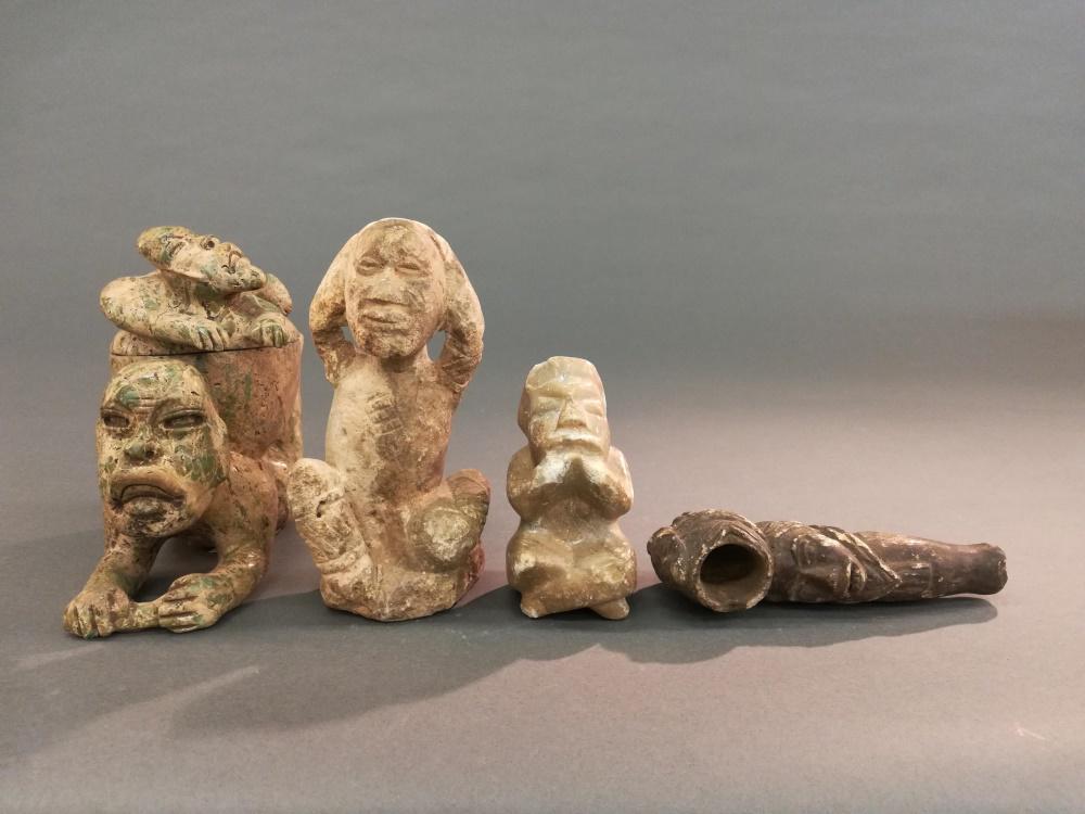 4 Pre-Columbian Style Stone Objects. 20th c.: A group of four Pre-Columbian style stone objects. Mesoamerica. 20th century. Largest 6 1/2" x 3 3/4" x 7". Smallest 2 1/2" x 1 3/4" x 6 1/2".