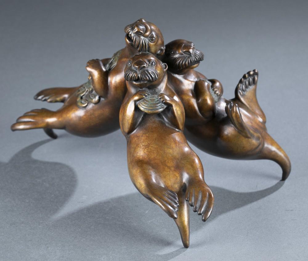 Jacques & Mary Regat, bronze, 1996.: Regat, Jacques & Mary (American, 20th/21st century). Untitled.1996. Bronze. Patina bronze depicting three otters, back to back, clutching crustacean. Marked, dated, and signed on bottom "36/75." 7 1/4