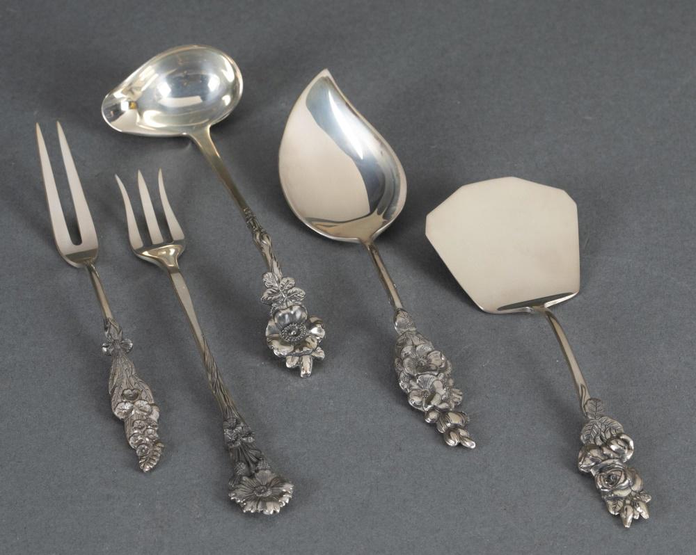 5 Reed & Baton, "Harlequin" utensils.: A group of five Reed and Barton "Harlequin" pattern, designed by Austin F. Jackson (1958-1976), sterling silver utensils. Marked on back. ++ One "Forget-me-Not" fork. 5 1/4". ++ One "Tea Rose" server.
