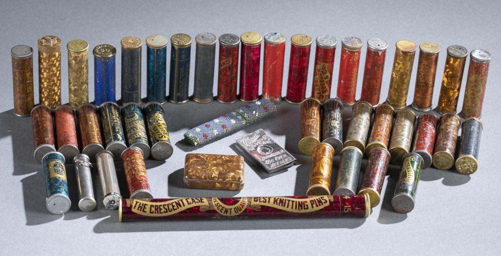45 Sewing Needle Containers: Forty-five sewing needle containers. Largest: 7 1/4". Smallest: 2 1/4". ++ Three Cross Fox needle cases. ++ Three Sears, Roebuck & co. needle cases. ++ Five Kirby, Beard & co. needle cases. ++ Four Cr