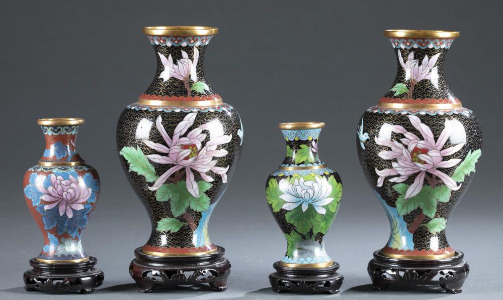 4 Chinese cloisonne vases.: A group of four Chinese cloisonne vases. All come with wooden bases. ++ A Pair of vases with flowers and birds over a black background. Approximately: 8 1/2" x 4 3/4". ++ Two smaller vases with lotus