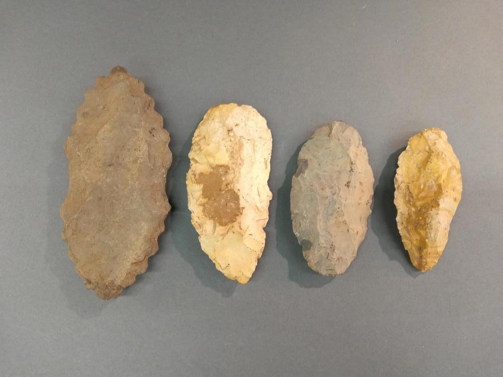 4 Native American Stone Arrowheads.: A group of four Native American stone arrowheads. Largest 6 1/2" x 3" x 1 1/2". Smallest 4 1/4" x 2" x 1 1/4".