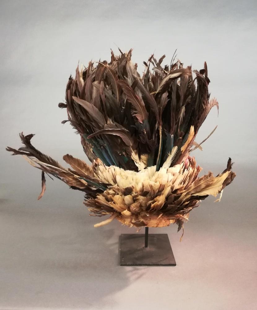 Cameroon Grasslands Feathered Headdress.: A feathered headdress from Cameroon Grasslands. 20" x 27". Dust throughout. Ex collection of John Buxton of Shango Galleries. Provenance: Ex collection of John Buxton of Shango Galleries.