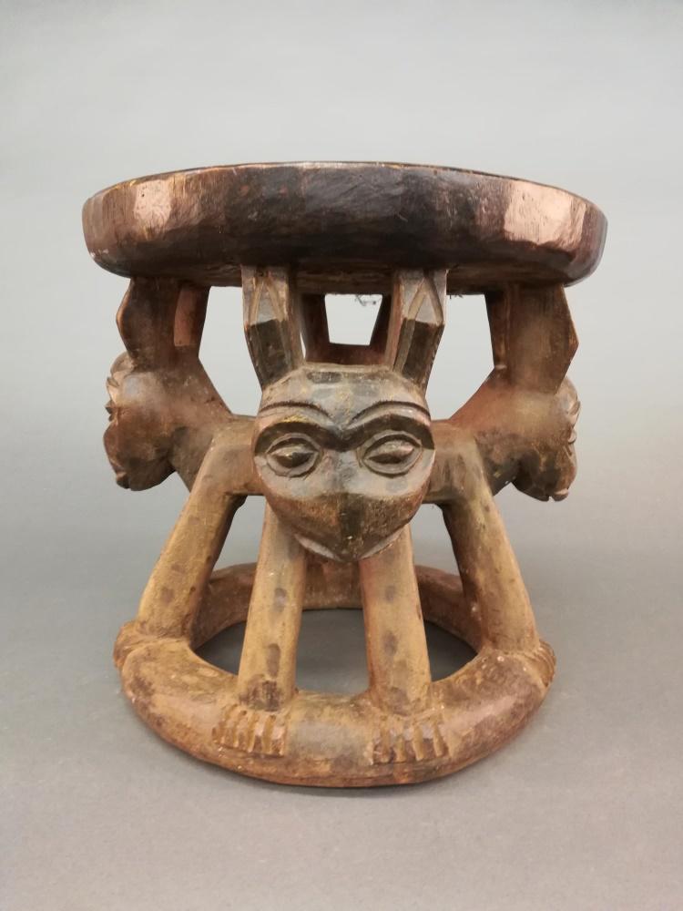 Cameroon Style Stool. 20th c.: A Cameroon style stool. 20th century. Wood. Central African. 15 1/2" x 15 1/4".