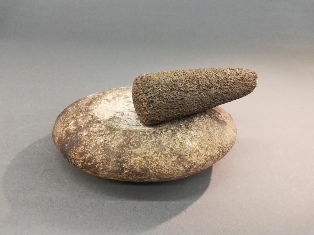 Mortar & Pestle.: A mortar and pestle. ++ Mortar. Possibly North American. 3" x 10" x 8 1/2". ++ Pestle. Possibly Polynesian. 6 1/2" x 3" x 2 1/4".