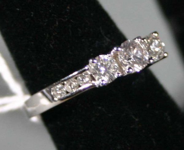Three diamond ring 14K white gold band
