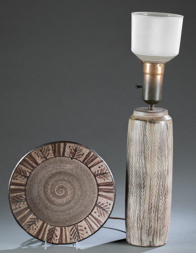 2 Nancy Wickham Boyd stoneware pottery pieces.: A group of two Nancy Wickham Boyd (American b.1923) glazed stoneware pieces including a plate and attributed lamp. ++ Plate with swirl and leaf design. Incised signature on base. 12 1/2". A few glaze 
