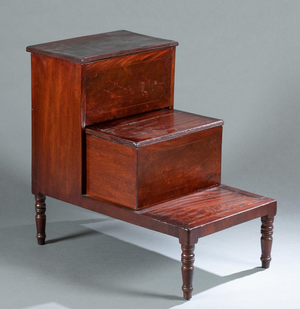 English mahogany bed steps, 19th c.: A set of English mahogany bed steps. First half of the 19th century. Three tiered steps. Central step slides out and opens into a storage compartment. Supported on four turned legs. 25 1/2" x 16 3/4"