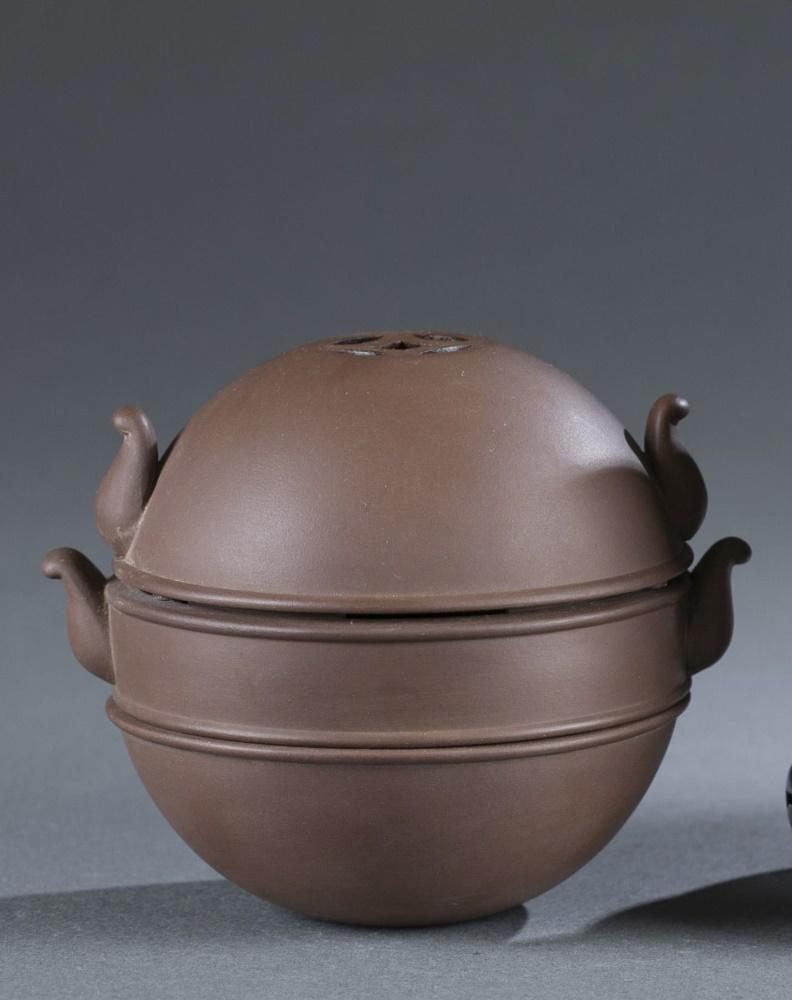 Small Yixing zisha ceramic censer.: A small Yixing zisha ceramic censer/ incense burner. flat base ceramic censer with double handles and cover. Marked on base. Approximately: 4" x 4 3/4". Shipping: This lot does not qualify for in hous