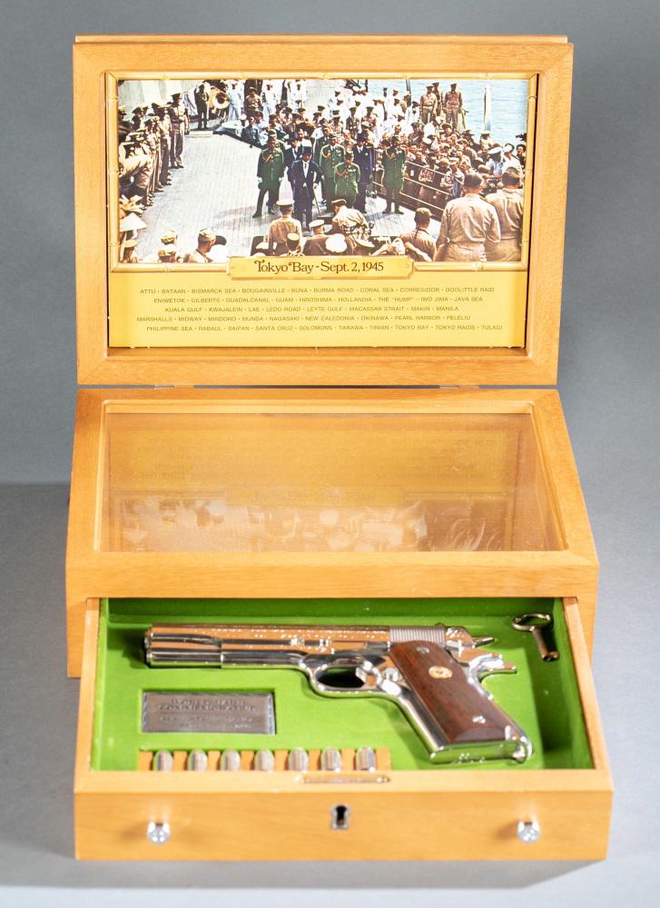 Colt WW2 Rheims Commemorative 1911 Pistol: Colt WW2 Rheims Commemorative, European- European Middle East Theatre of Operations. 1911 semi-automatic pistol, .45 auto. Nickel finish with bird's eye maple grips. Slide engraved with oak leaf patte