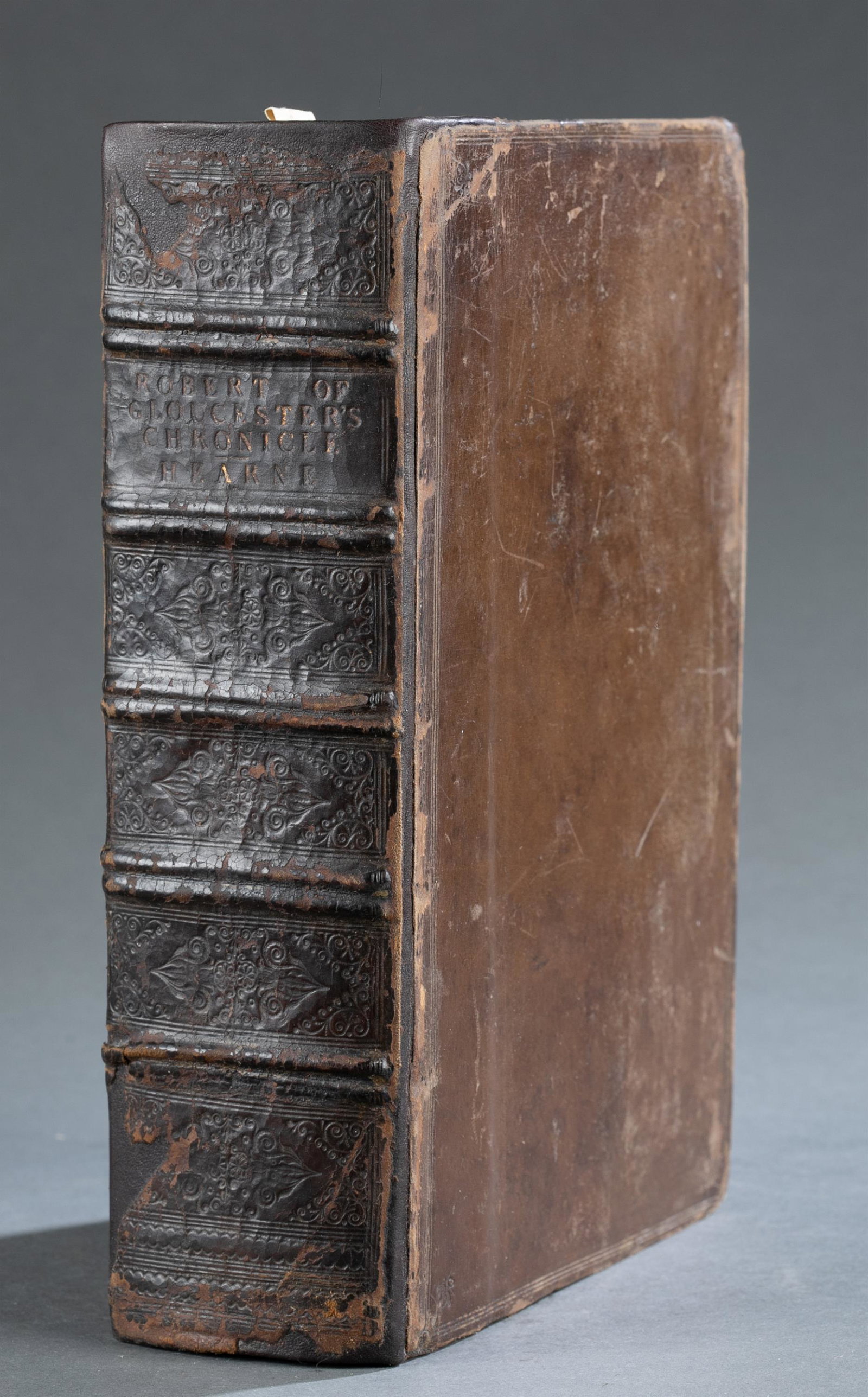 Hearne. Robert of Gloucester's Chronicle. 1724.: [History] 2 volumes in one. Hearne, Thomas. Robert of Gloucester's Chronicle. Printed at the Theater, Oxford, 1724. 4to. lxxxv, [1], 792 pp. Contemporary leather boards, rebacked. Condition Good. Rubb
