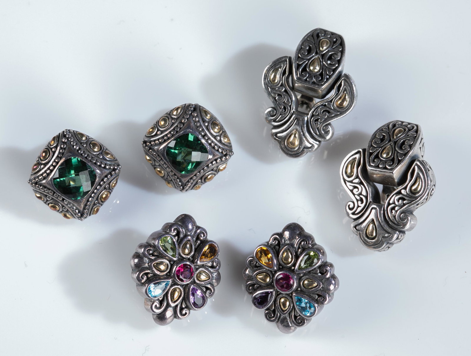 3 Pairs of BJC 18k gold on sterling earrings.: A group of three pairs of Samuel Benham BJC 18k gold on sterling silver clip on earrings. Stamped "BJC 925 18k" on back. ++ Square earrings with green gemstone. Approximately 5/8" x 5/8" and 15.5g. ++