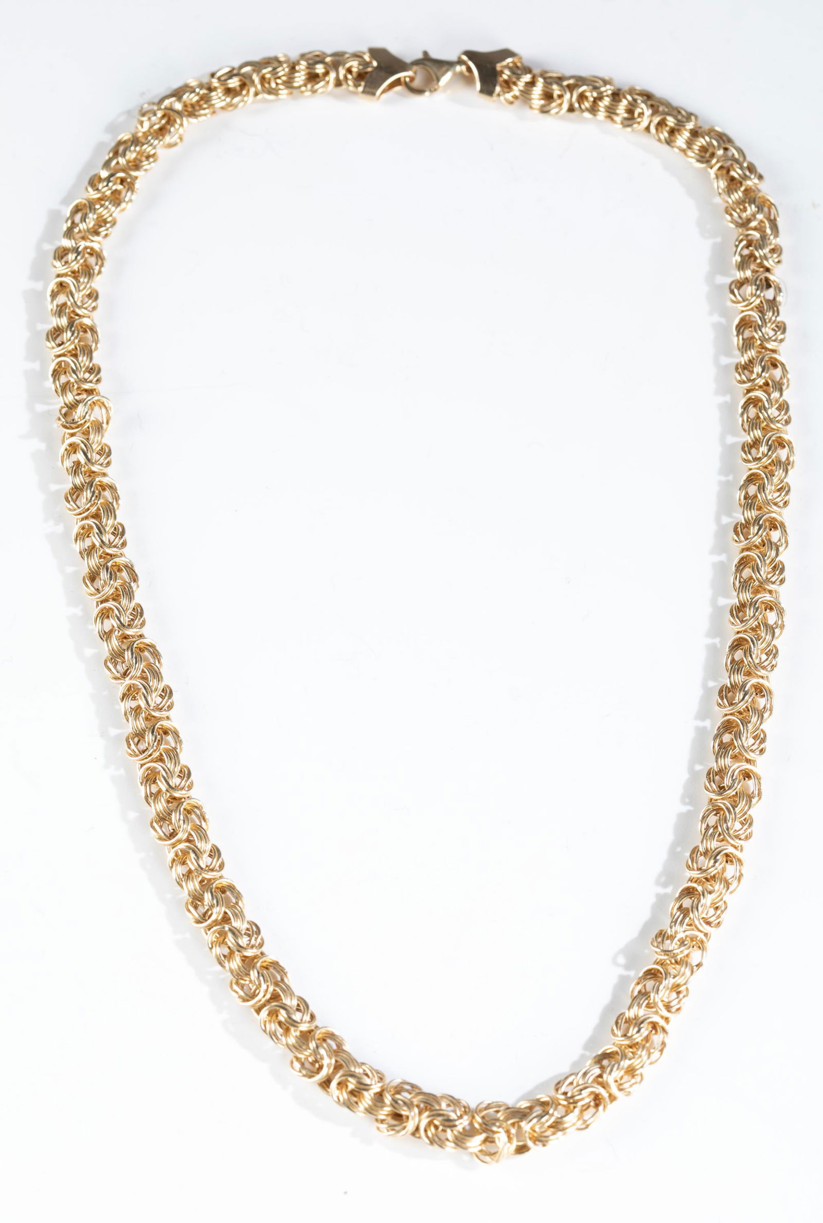 14k Gold double cable chain necklace.: A 14k yellow gold double cable chain necklace with lobster claw clasp. Stamped "Au 14k" near clasp. Approximately 19" and 12.8g.