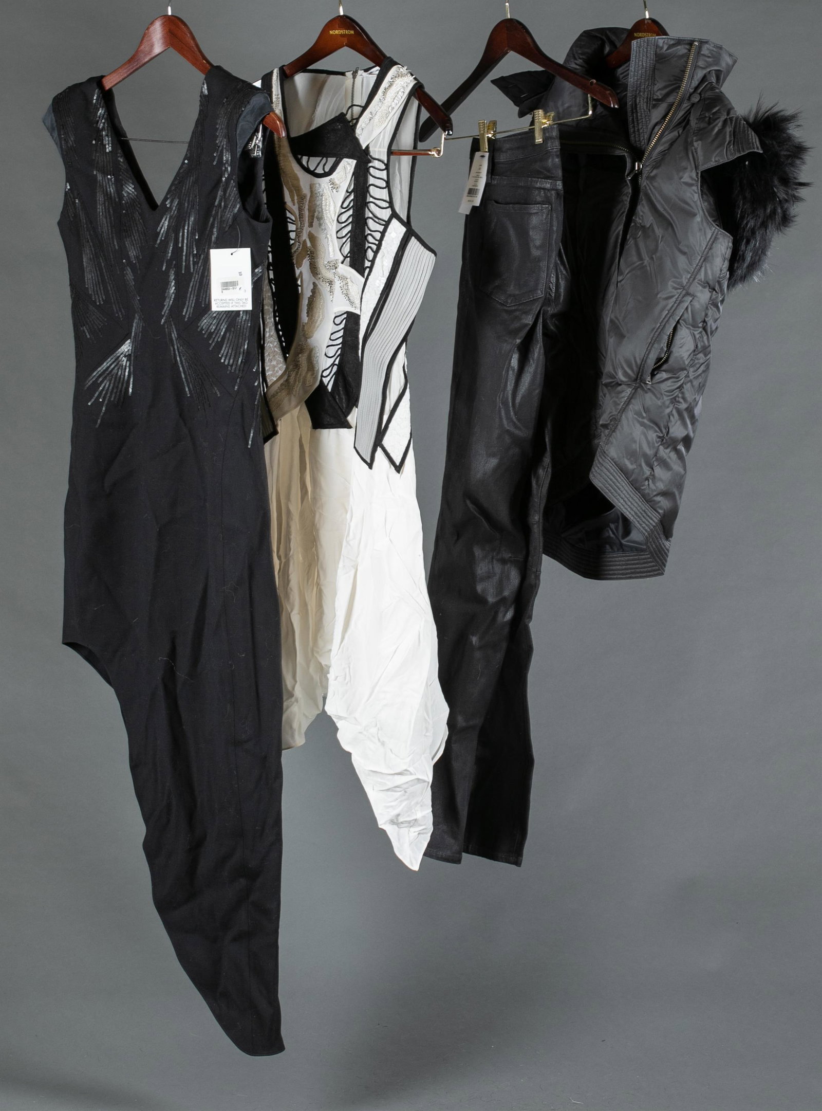 4 Helmut & Helmut Lang articles of clothing.: A group of four Helmut and Helmut Lang assorted articles of clothing. ++ Black puffer vest with detachable Asiatic raccoon fur trimmed hood. Size Medium. ++ White sleeveless silk dress with asymmetric