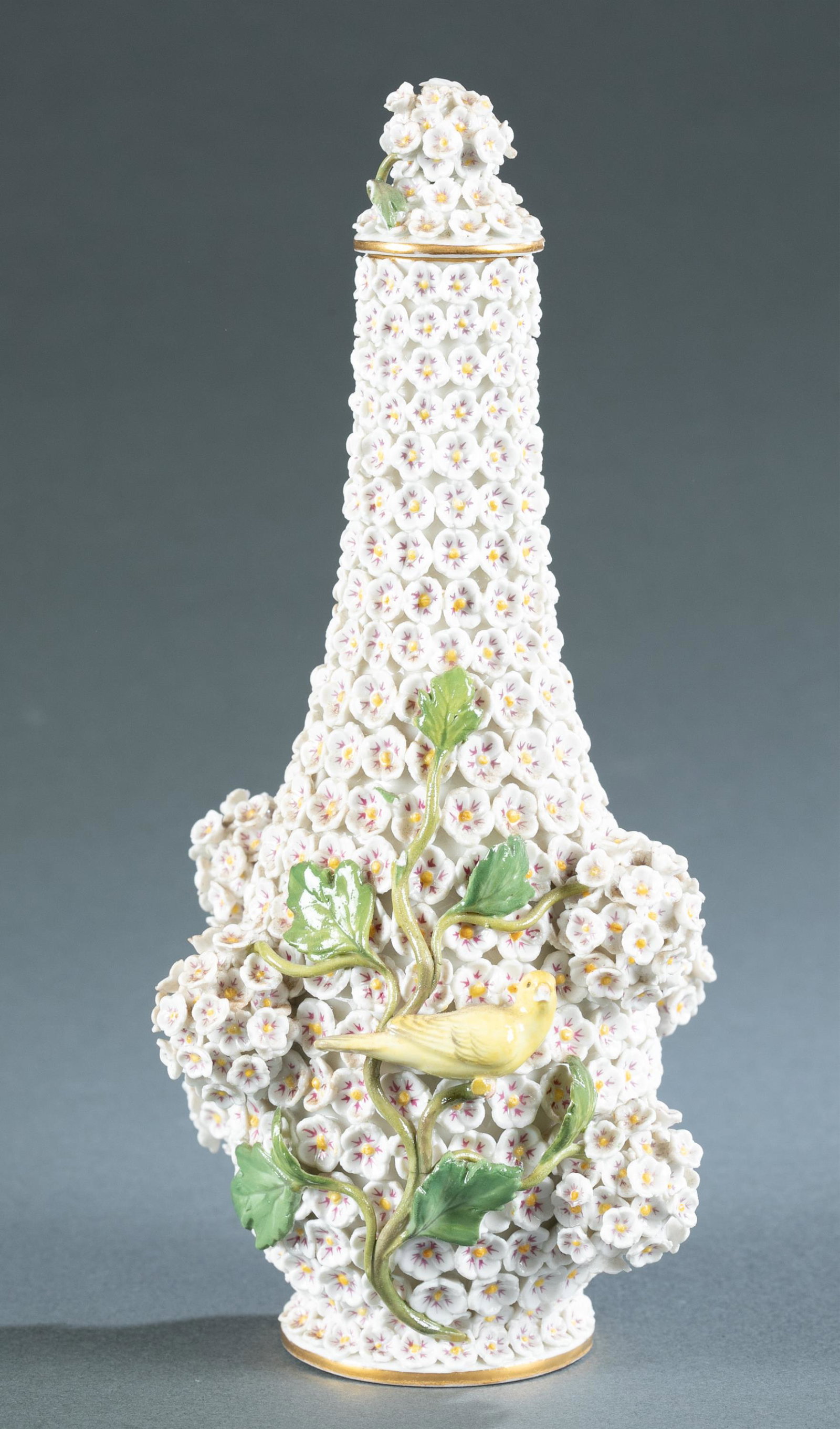 Meissen snowball flask with stopper.: A Meissen snowball Schneeballen porcelain flask with yellow birds and a floral motif. Circa 1815-1924. Matching stopper included. 8 7/8" x 4". Condition: Some chipped flowers. Provenance: Provenance: