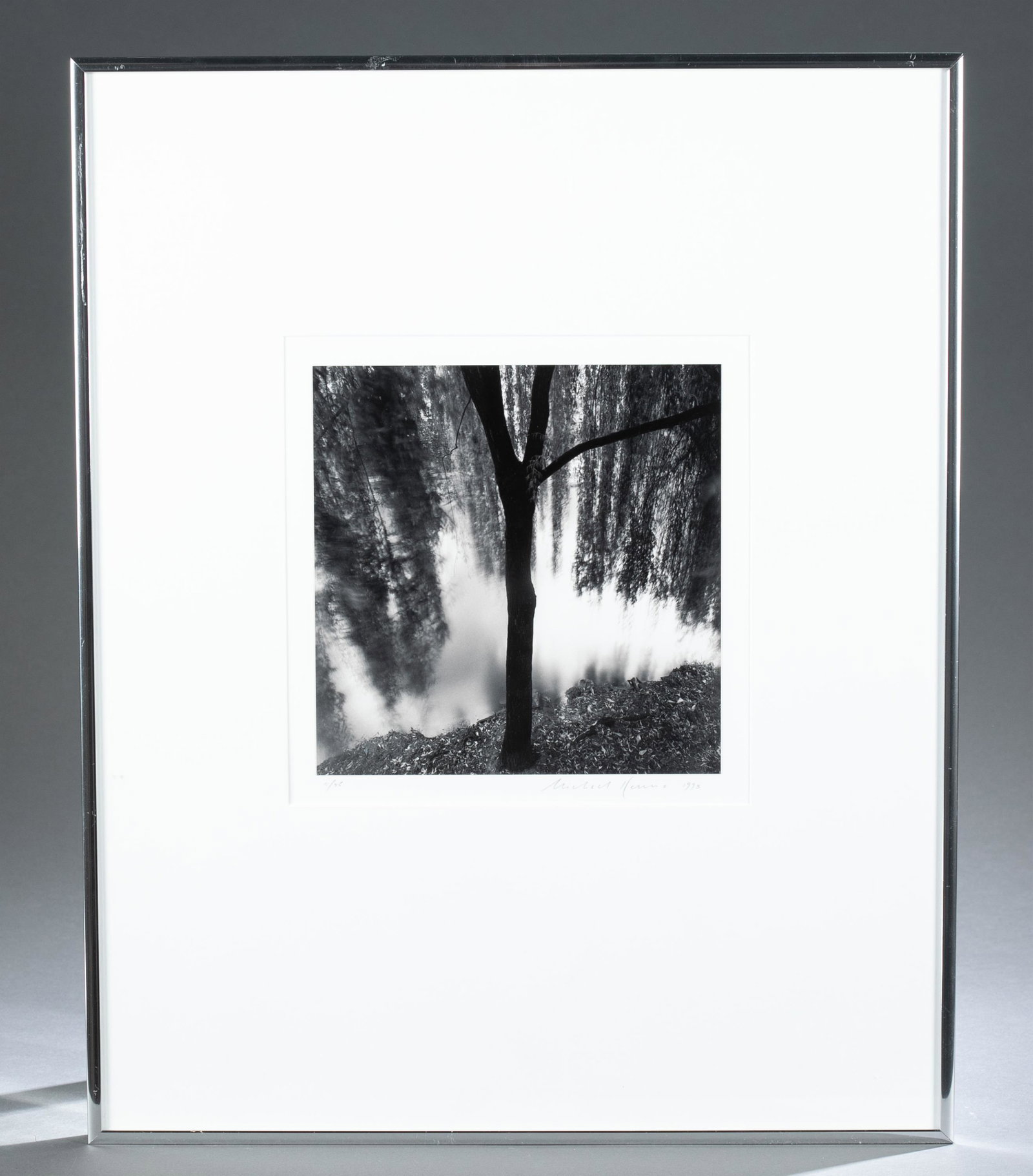Michael Kenna. Silver Print. Tree. 1993.: Kenna, Michael (British, b.1953). "Tree". 1993. Gelatin Silver Print. Limitation l.l.: 11/45. Image: 7.5" x 7.5". Framed: 16" x 20". Signed, dated in pencil l.r. Net proceeds from this sale with be di