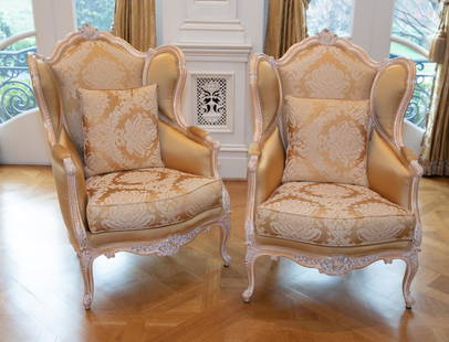 2 Italian French Provincial bergere chairs.: A pair of Italian French Provincial style bergere chairs. Imported by David Michael model GL-2303-B-P. Carved European Beechwood on cabriole legs. Light pink upholstery with foliate and floral
