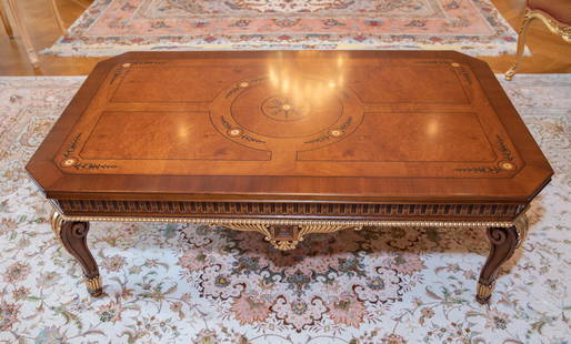 Louis XV style coffee table.: A Louis XV style coffee table. Burlwood veneer and marquetry inlaid top. Scroll form legs with acanthus leaf decoration. 20 1/2" x 32" x 56".