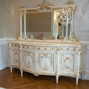 Italian Louis XV sideboard.: An Italian Louis XV sideboard. Meroni Francesco E Figli for Versailles Galleries. Four paneled mirror with gold and floral swag accents. Four drawer over four door breakfront crackle glaze sideboard