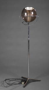 Sonneman style swivel eyeball floor lamp.: A Sonneman style eyeball floor lamp. Foot switch on power cord. 20th century. 16" x 48".Condition: Surface dirt on shade and base, light scratches to stand.Provenance: The Estate of Giraud V. Foster.