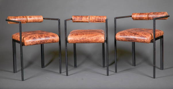 4 Contemporary alligator leather chairs.: A group of four matching contemporary alligator leather chairs. Wood frame with metal arm with alligator leather seat and back. 27 1/2" x 20" x 20 1/2".
