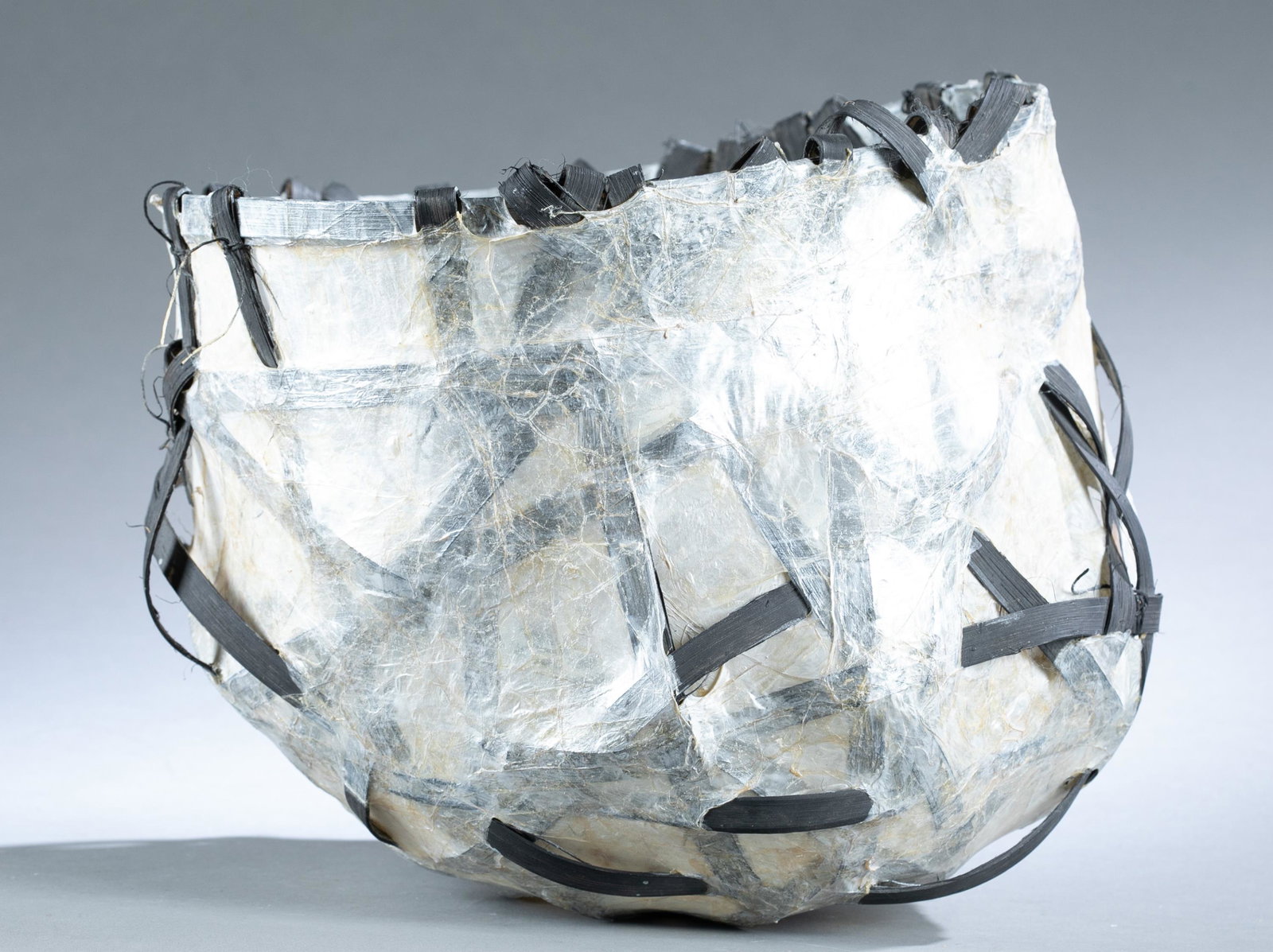 Lillian Elliott and Pat Hickman, vessel.: A Lillian Elliott (American, 1930-1994) and Pat Hickman(American, b. 1941) sculptural vessel of reeds and hog casing. 10 1/2" x 12"Provenance: From the collection of Shirley Jacobs