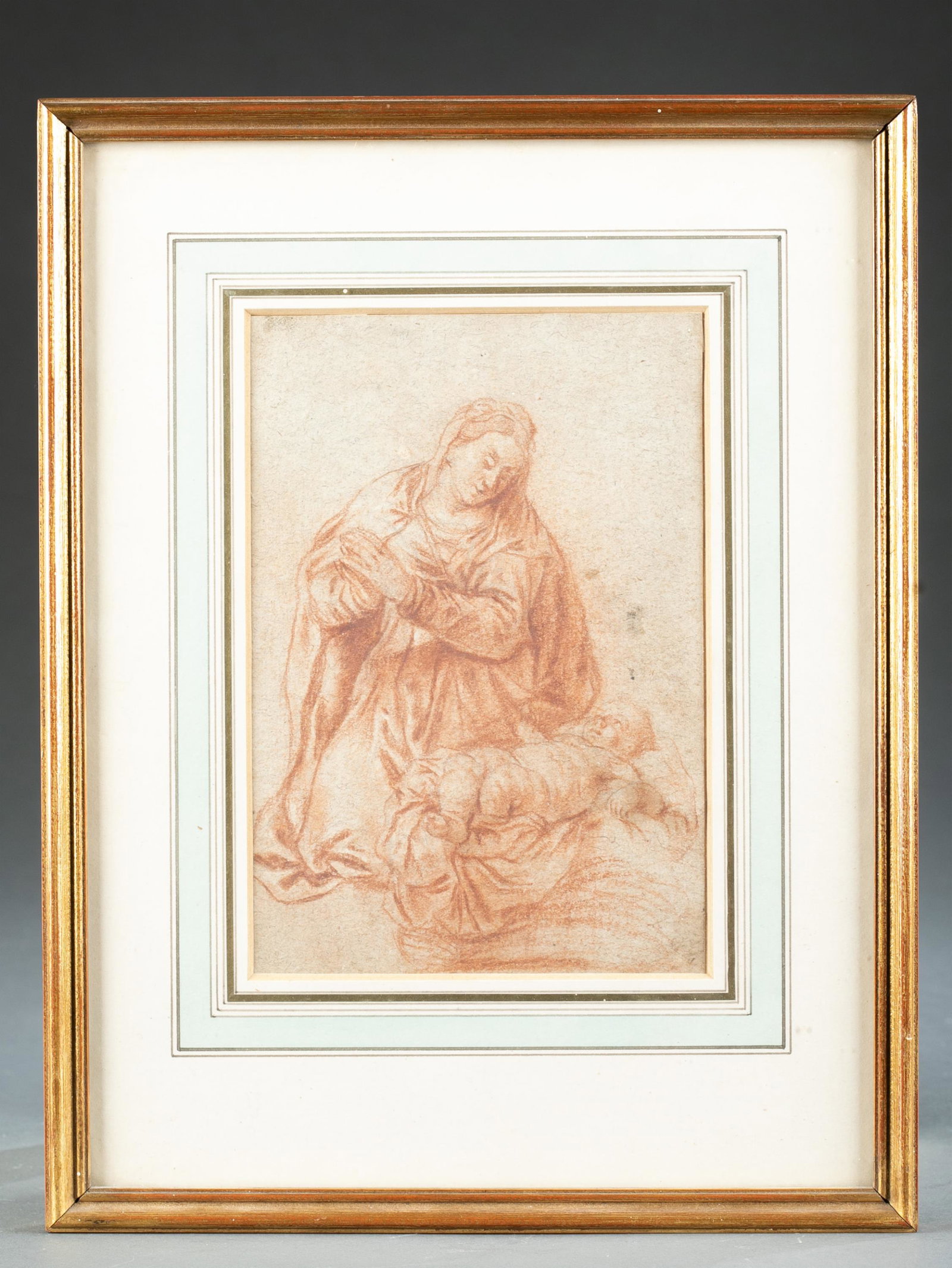 Old Master red chalk drawing of woman and child: An Old Master study of a woman and child. Red chalk on rag paper circa 1790, trimmed and mounted on 19th century laid paper. Frame: 12 1/2" x 9 3/4". Sight: 7 1/2" x 5".Condition: Toning.Provenance: F