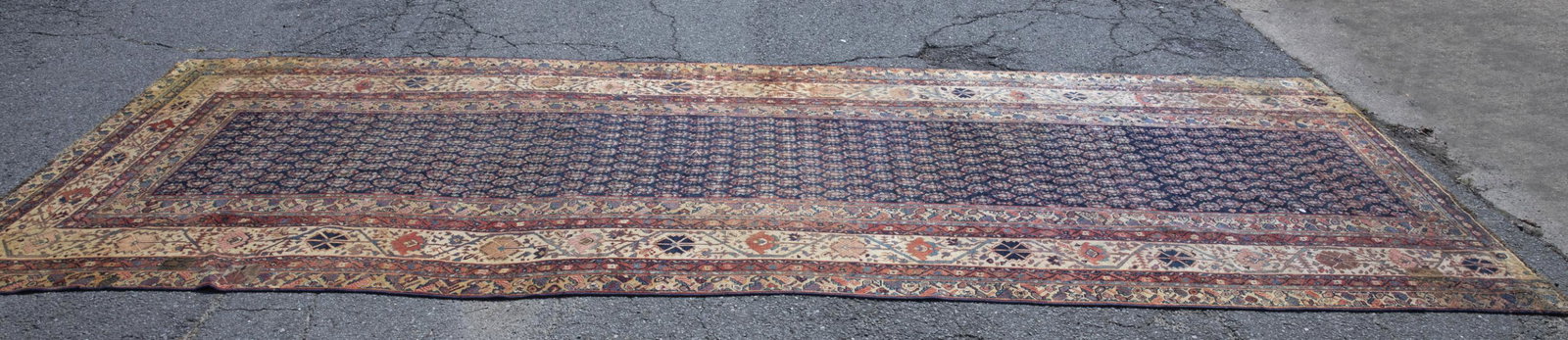 Antique Persian Malayer wide runner.: Antique Persian Malayer wide runner,. c.1900. Hand knotted wool pile. 6'6" x 18'2".Condition: One end border is missing. Some patched sections and sections of low pile. Discoloration and staining. Los