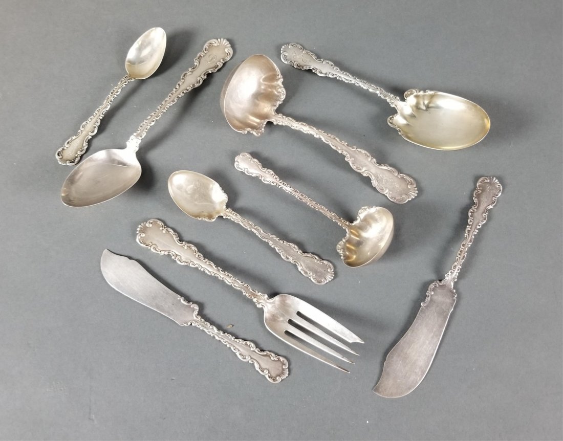 Whiting Mfg. Co. Louis XV sterling flatware.: Whiting Mfg. Co. \"Louis XV\" pattern sterling flatware service, pieces. Charles Osborne (American, 1847-1920). This includes nine 5 1/2\" tea spoons, five 7 7/8\" serving tablespoons, one 7 5/8\" gol