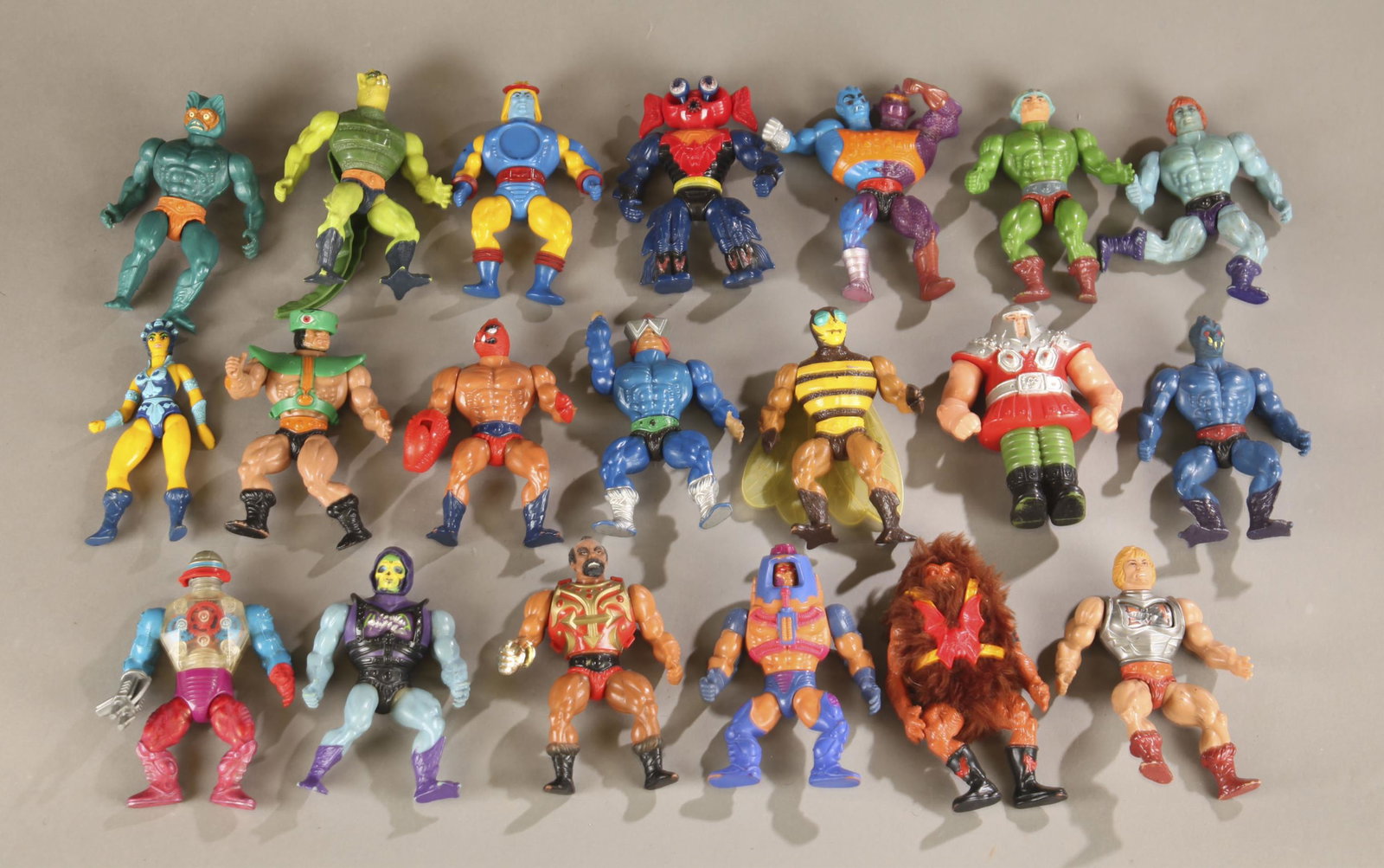 20 MOTU action loose figures.: A group of twenty Mattel Master's of the Universe loose action figures. Two have chest armor. 5 1/2" tall.