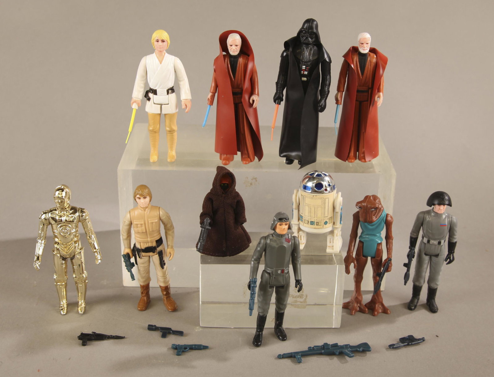 9 Star Wars original series loose figures.: A group of Nine Kenner Star Wars original series loose figures. ++ Seven 1977 Star Wars figures. Includes complete Luke Skywalker with single telescoping lightsaber, two Ben Kenobi figures with single