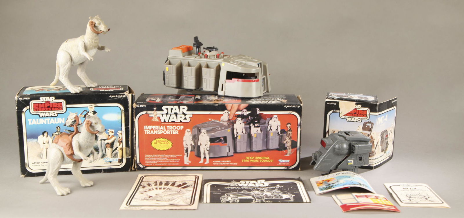 3 Star Wars original series vehicles with boxes.: A group of three Kenner Star Wars original series vehicles in original boxes. ++ 1983 Star Wars: The Empire Strikes Back INT-4 Interceptor. Missing laser canon. Includes original paperwork. Box 6" x 9