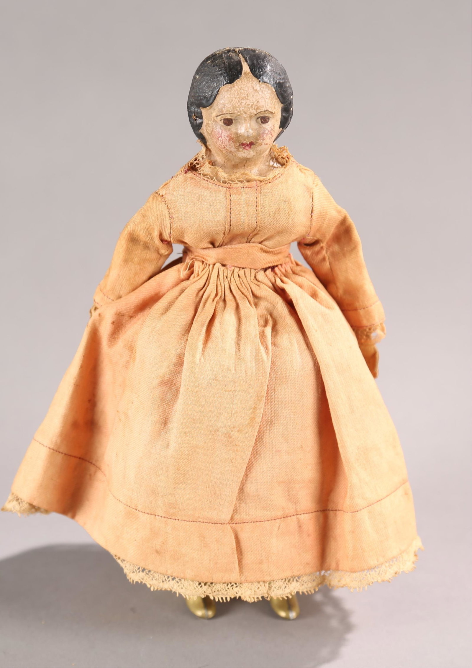 Autoperipatetikos paper mache walking automaton.: Autoperipatetikos paper mache automaton walking mechanical doll, Circa 1862. Paper mache head. Leather arms with linen covered body. Linen dress with fringe and linen slip. Marked on bottom "July 15th