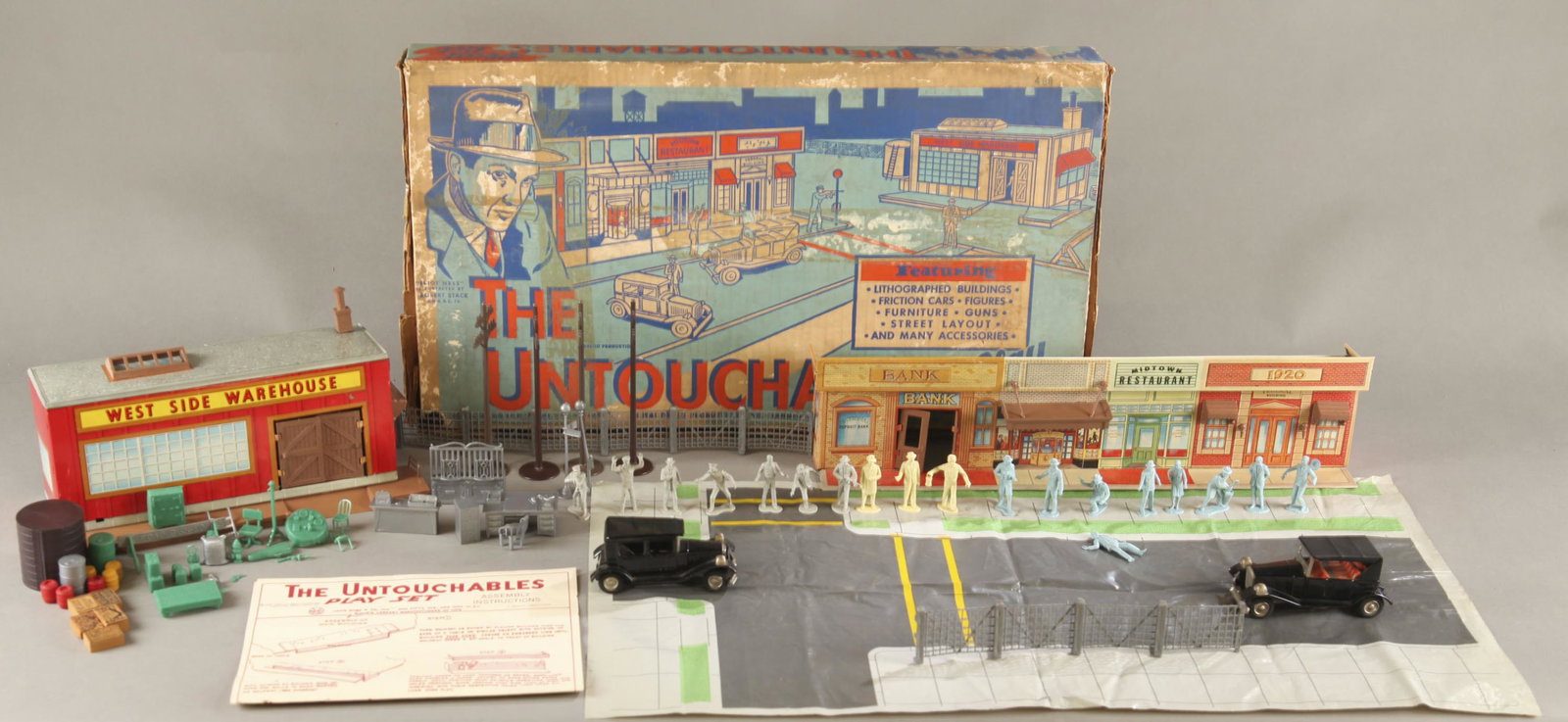 Rare Marx The Untouchables playset in box.: Rare Louis Marx & Co. The Untouchables #4676 play set in box, circa 1961. Appears mostly complete. Includes tin litho warehouse, tin litho main street, tin litho Rolls Royce car, tin litho touring car