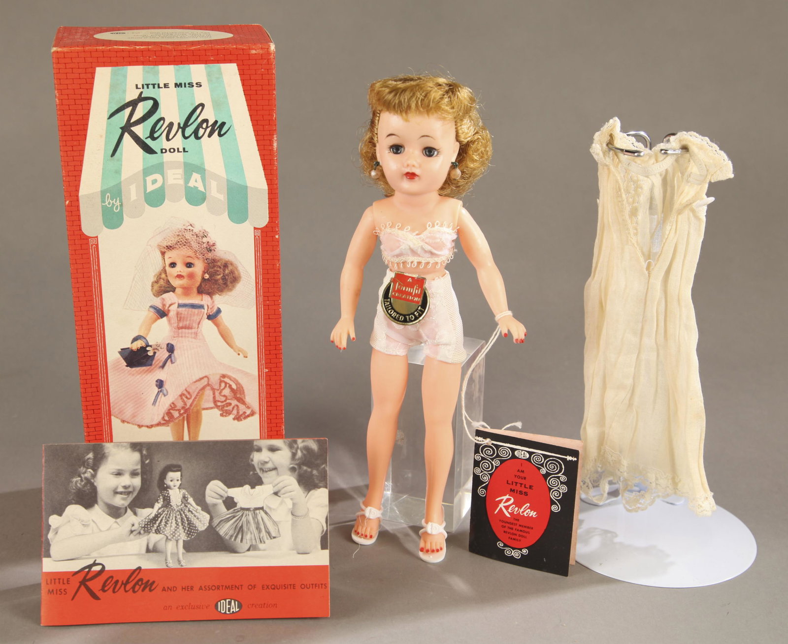 Ideal "Little Miss Revlon" doll MIB.: Ideal "Little Miss Revlon" Pony Tail Platinum doll, Circa 1956. Mint in box. Includes doll with original body and and hang tag, slip dress and paperwork. Doll 10 1/2". Box 2 1/2" x 10 3/4" x 4 1/2"