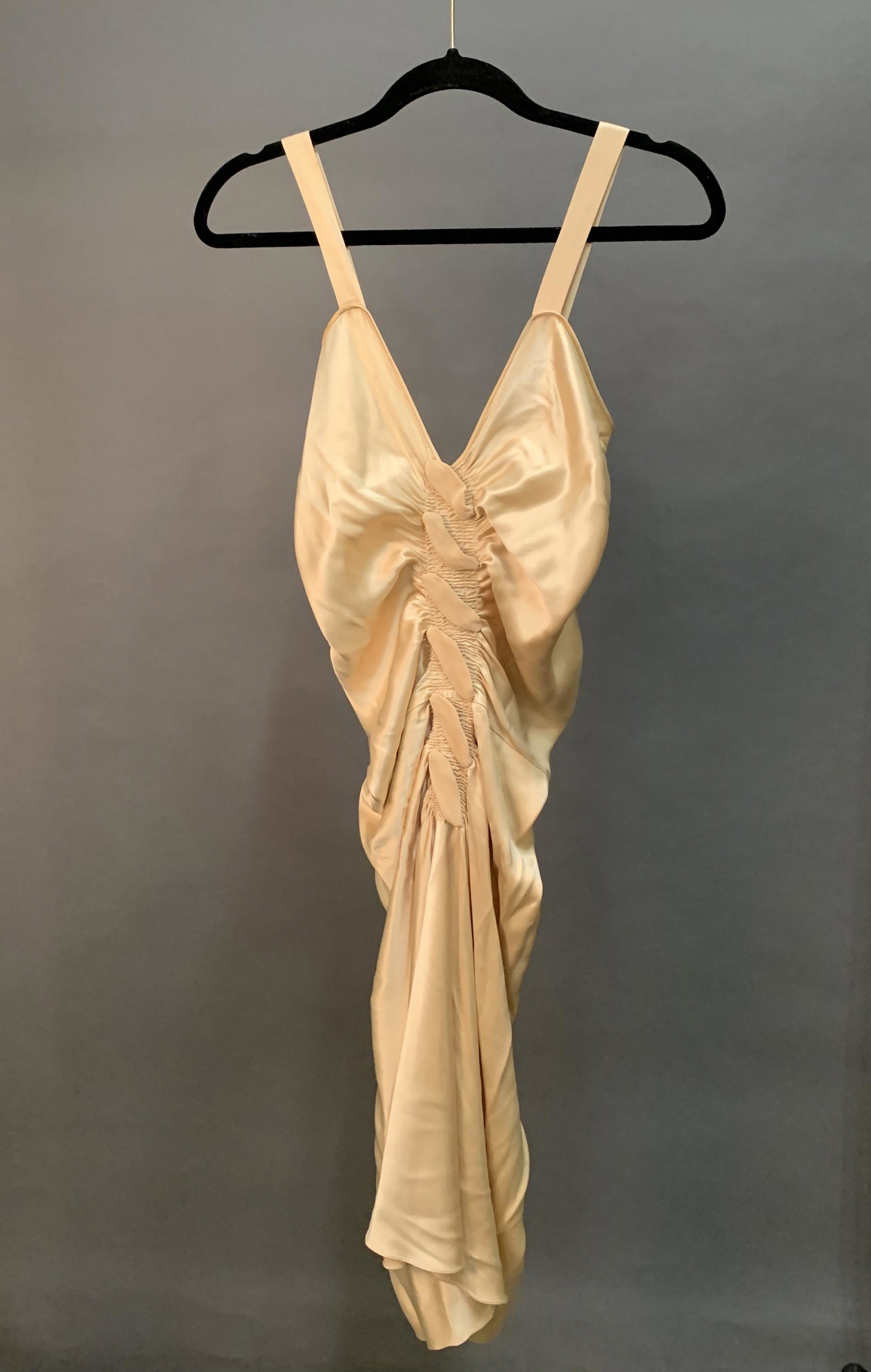 Designer Silk Dress.: A designer gold silk formal dress with bustle buttons on back. A-line dress.