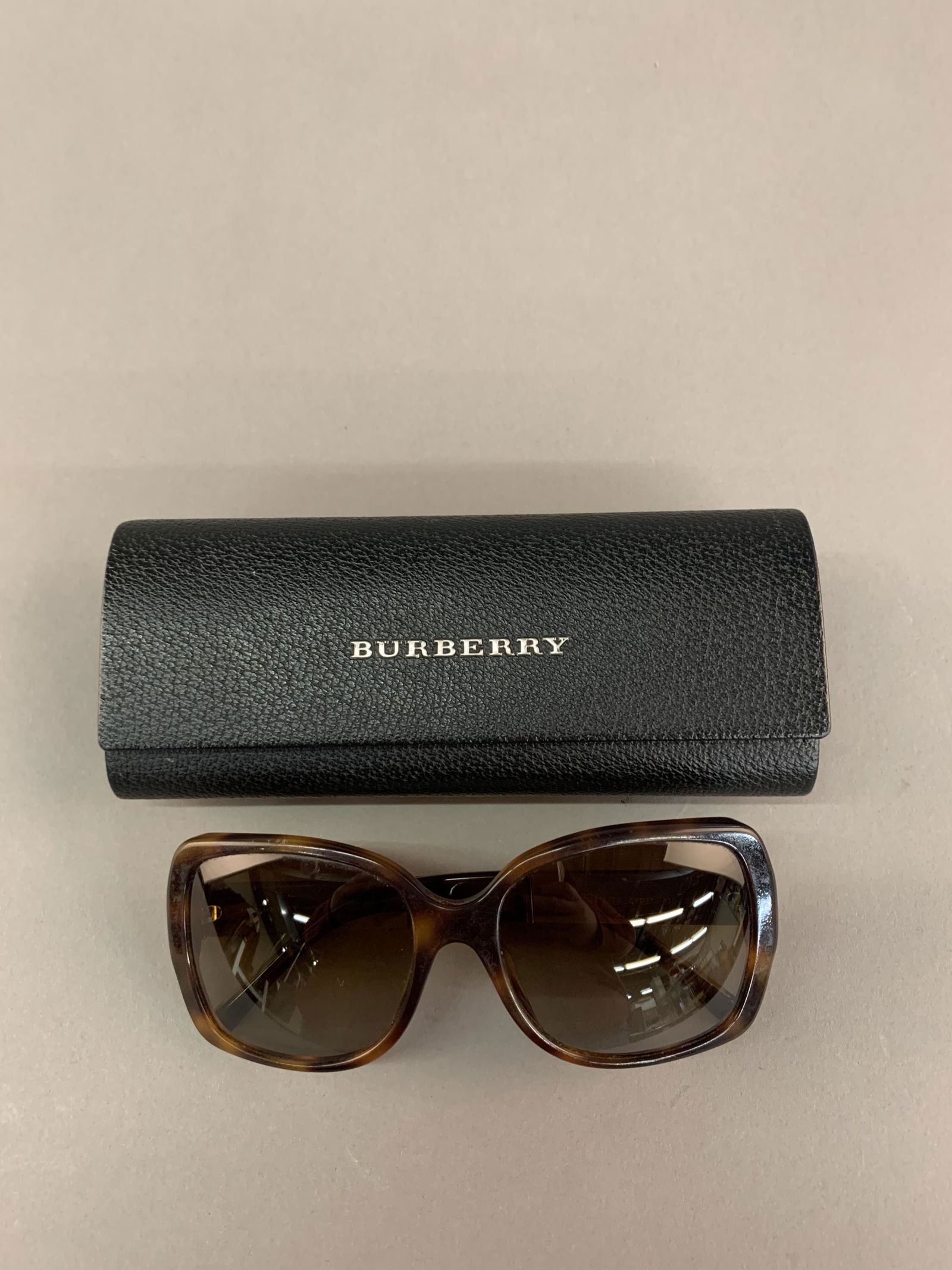 Burberry brown polarized sunglasses. (1 of 6)