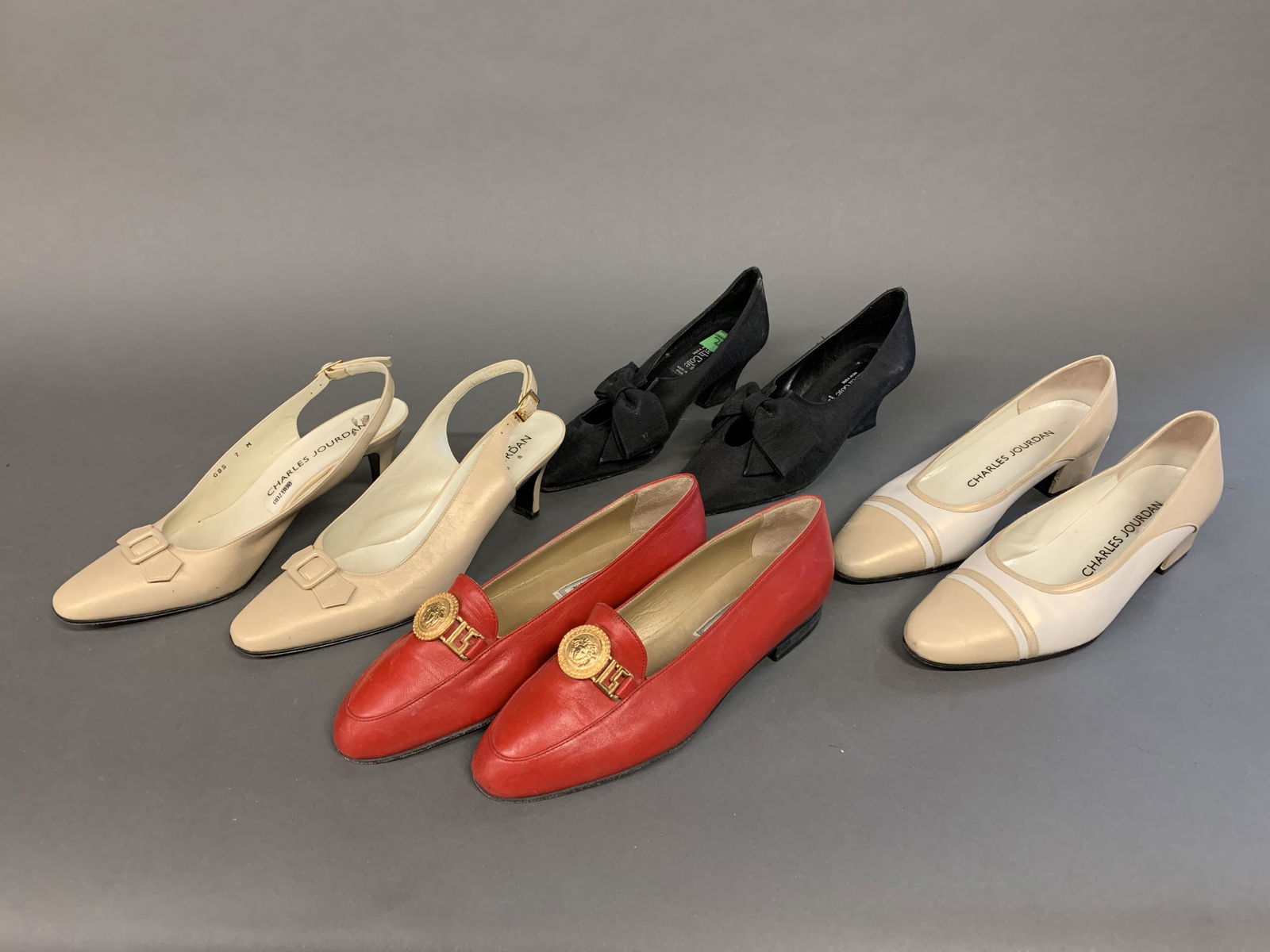 4 Pairs of designer shoes. (1 of 6)