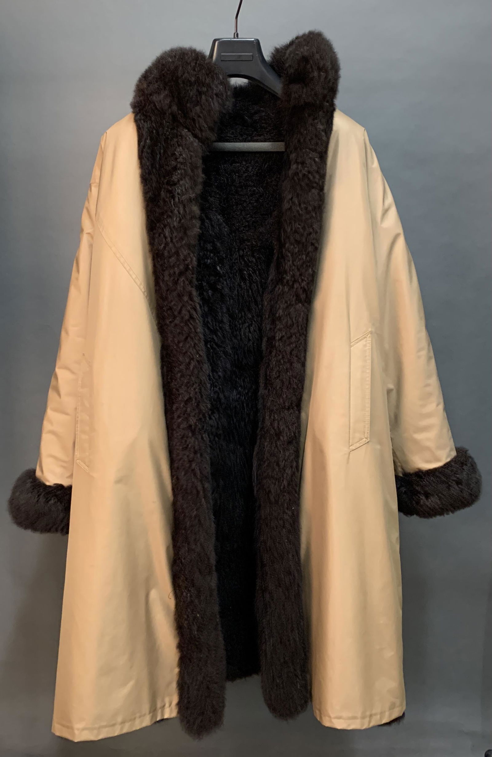Canvas coat with shearling trim. (1 of 2)
