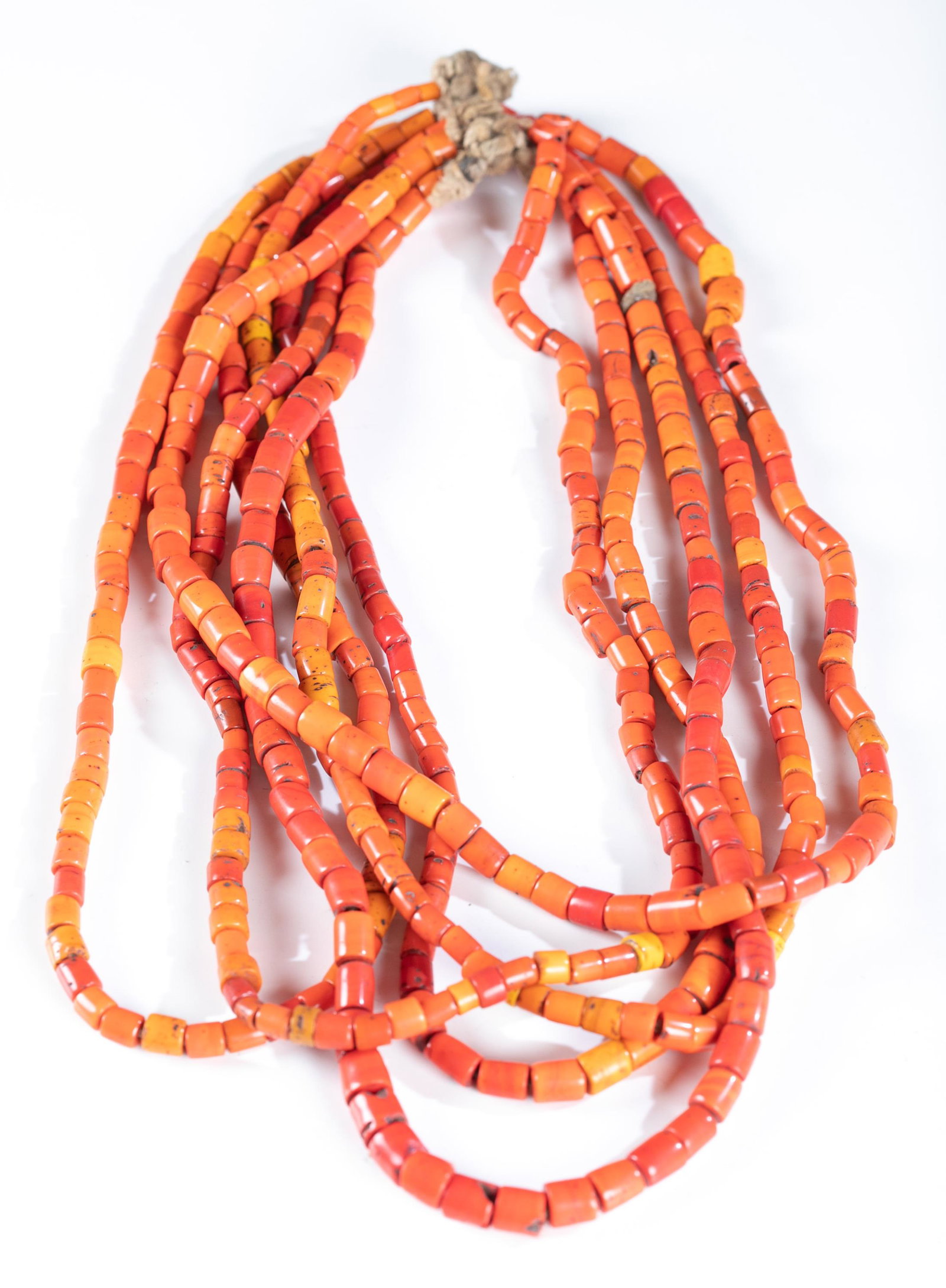 Coral necklace.: A six strand coral necklace. Simple knotted rope enclosure. 24". Provenance: The Estate of Giraud V. Foster.The Estate of Giraud V. Foster.
