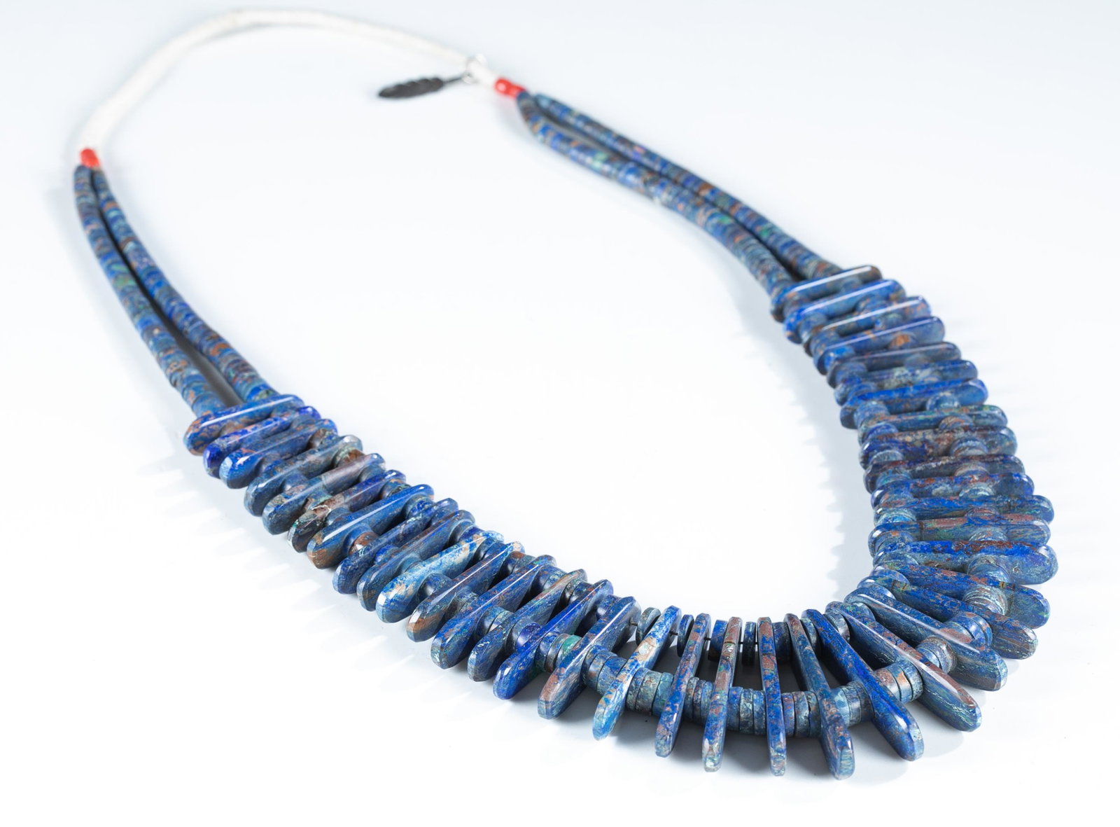 Jbird lapis lazuli necklace.: A Jbird lapis lazuli necklace. Marked on feather charm. 30". Provenance: The Estate of Giraud V. Foster.The Estate of Giraud V. Foster.
