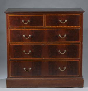 Flame mahogany chest of drawers.: A chest of drawers, 20th century. Flame mahogany veneer on drawer front with boxwood cross banding. Five drawers with brass pulls. Smith and Co. Ltd., Paris retail label on reverse. 42" x 42 3/4" x