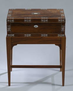 English rosewood writing box on stand.: An English rosewood writing box on stand, circa 1860-70. Writing desk has mother of pearl foliate and silver inlay with mother of pearl escutcheon. Interior has felted writing surface with two glass